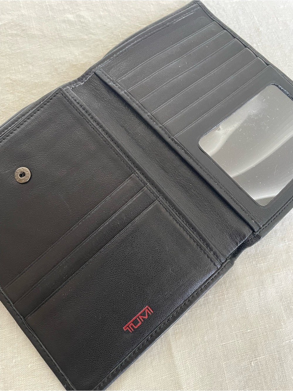 NWOT Tumi Black Leather Bi-Fold Wallet with ID Window